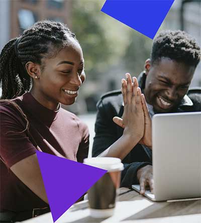 Two people working on their laptop