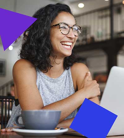 Happy woman working on laptop